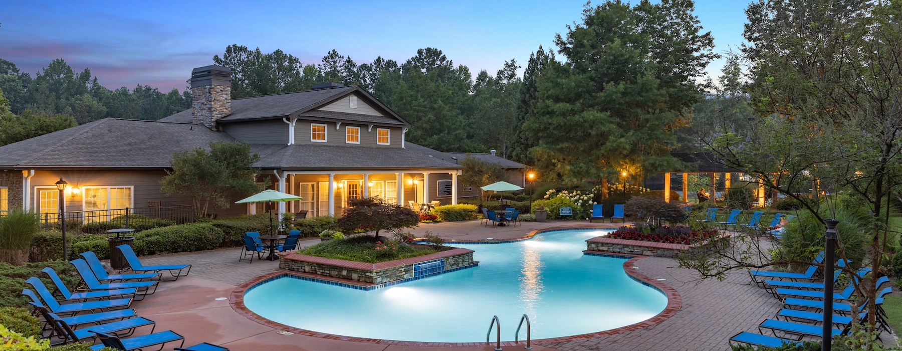 View of pool at sunset